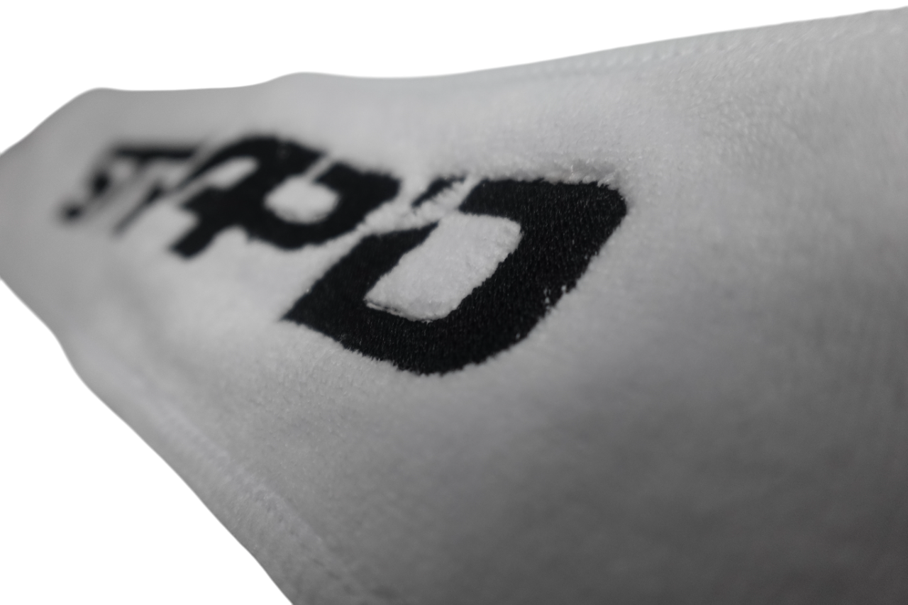 “STRAP’D 30” White Football Towel – ONLY THE STRAPD SURVIVE